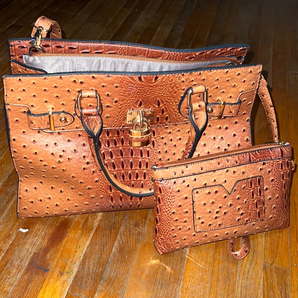 Ostrich print bag with shoulder strap and a smaller bag.